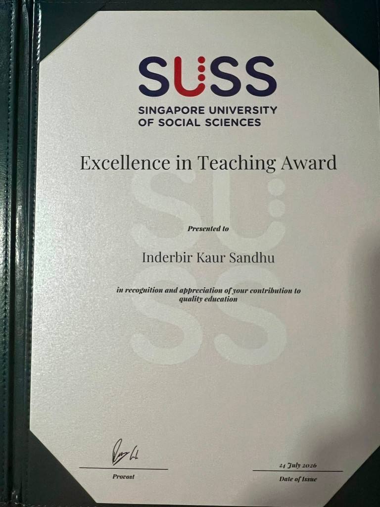 Dr Inderbir Kaur Sandhu's SUSS Excellence in Teaching Award 2026 certificate, presented by Singapore University of Social Sciences on 24 July 2026