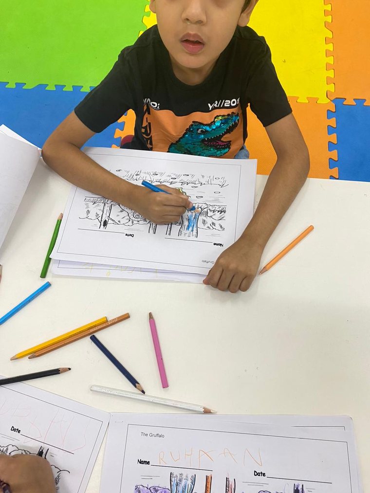 Kunwer Sachdev's eight-year-old son colouring for hours, deeply focused